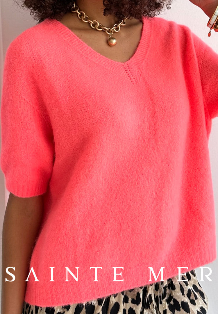 Short-sleeved knitted sweater in bright coral "Made in Italy"